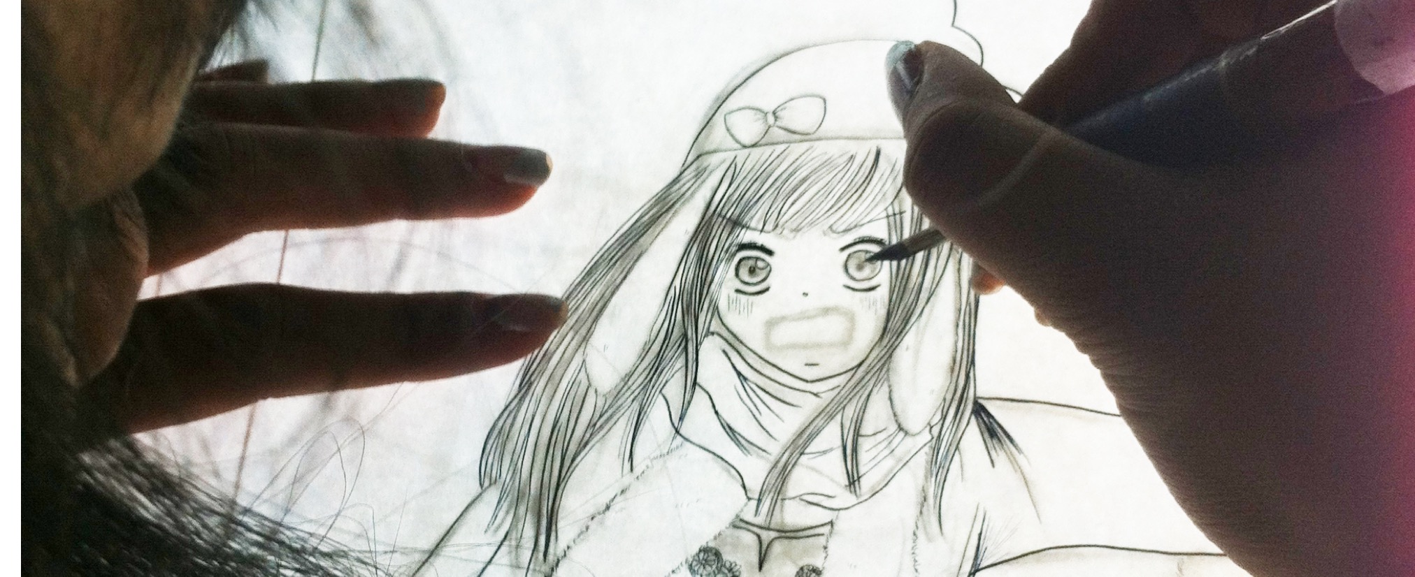 dessin une fille sur table lumineuse